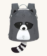 The Lassig tiny kids backpack in grey, with a racoon face printed on and 3D ears and tail