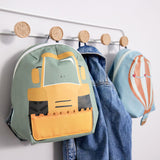 Lassig kids tiny backpack in digger and balloon design hanging from hooks with a denim jacket inbetween