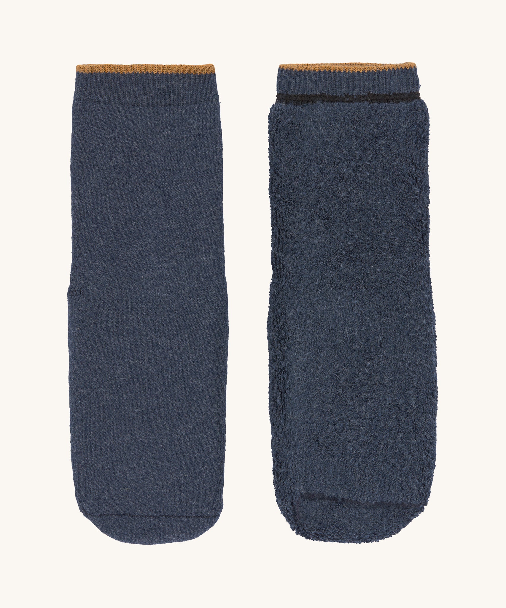 The Lassig organic cotton anti-slip grippy socks in navy blue.