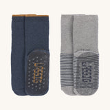 The Lassig organic cotton anti-slip grippy socks 2 pack, onepair is in a navy blue and one is in grey.