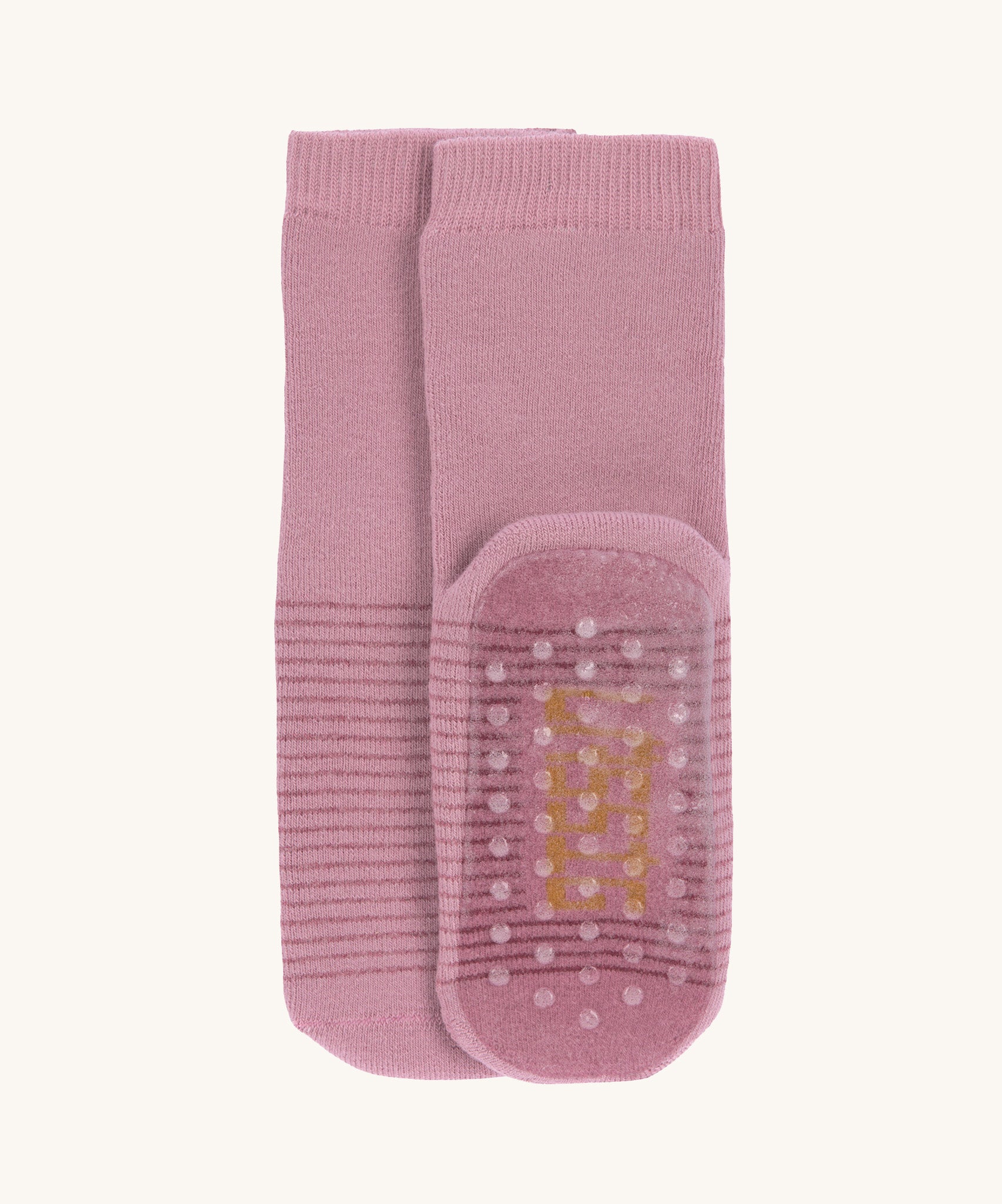 The Lassig organic cotton baby and toddler anti-slip grippy socks in light pink.