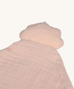 A closeup of the pink cloud attached to the Lassig organic cotton baby comforter.