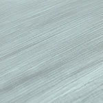 A closeup of the Lassig organic cotton muslin fabric, in a silver grey