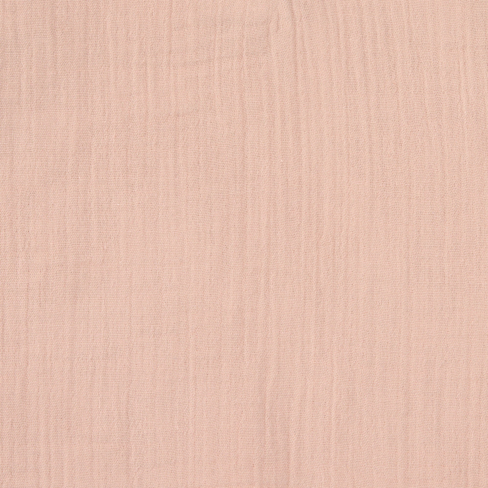 A closeup of the beautifully soft organic cotton muslin material, in a pale powder pink, from Lassig.