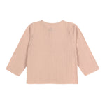 The back of the Lassig organic cotton muslin long sleeved top for babies and toddlers, in a beautiful pale powder pink colour.