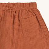 A closeup of the pocket detail on the Lassig organic cotton muslin pants.