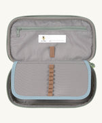 A close up of the inside of the Lassig spacy neon yellow pencil case showing the elasticated stationary holder detail and extra compartment with a zip fastener