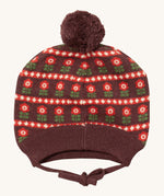 Little Green Radicals flower collecting knitted beanie hat available at Babipur. A dark brown knitted GOTS organic cotton beanie style hat with retro red flowers and matching brown pom pom on top. Features ties for a secure fit.