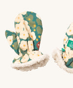 A close of the Little Green Radicals sherpa fleece mittens in hedgerow. Showing a close up of the squirrel in flowers print and white sherpa fleece detail on turquoise organic cotton fabric.