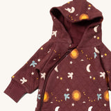 A close up of the Little Green Radicals hooded snug suit in flying birds showing the hood and zip detail on GOTS organic cotton fabric