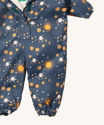 A close up of the Little Green Radicals night moon waterproof winter suit. Showing the elasticated cuffs detail for a snug fit on navy recycled polyester fabric