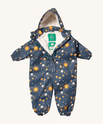 Little Green Radicals night moon waterproof winter suit  available at Babipur. A recycled polyester thick all in one outfit in navy with a cute starry night print. Features a hood, a white sherpa fleece inner liner, elasticated cuffs and black straps on the legs to go over footwear.