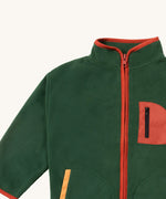 A close up of the Little Green Radicals polar fleece jacket in olive showing the turned up collar and red trim detail. Features a full length zip detail on dark green recycled polyester fabric.