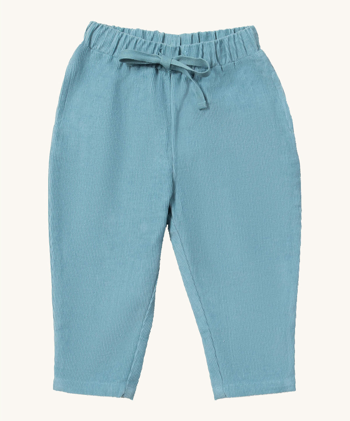Little Green Radicals comfy trousers in pale blue corduroy available at Babipur. A soft GOTS organic cotton trousers in blue with elasticated waistband for a comfortable fit and a matching drawstring.