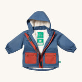 Little Green Radicals waterproof coat in moonlight blue available at Babipur. A thick blue with red trim winter's coat made from recycled polyester. Features a sherpa fleece inner liner, elasticated arm cuffs fora. snug fit and a full length zip  with a sherpa fleece inner liner