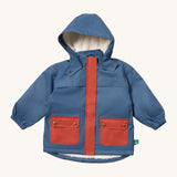 Little Green Radicals waterproof coat in moonlight blue available at Babipur. A thick blue with red trim winter's coat made from recycled polyester. Features a sherpa fleece inner liner, a hood, a full length zip and 2 side pockets.
