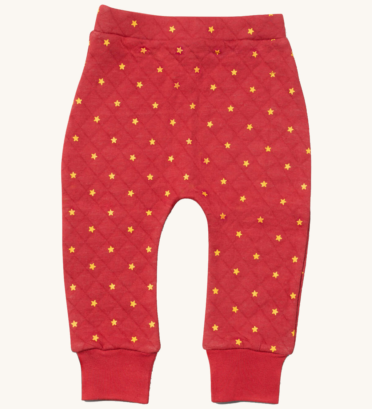 Little Green Radicals red star quilted joggers available at Babipur. A red GOTS organic cotton joggers with a quilted stitch with elasticated cuffs.