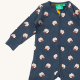 A close up of the Little Green Radicals navy sheep  baby grow, showing the zipper fastener detail on navy organic cotton fabric.