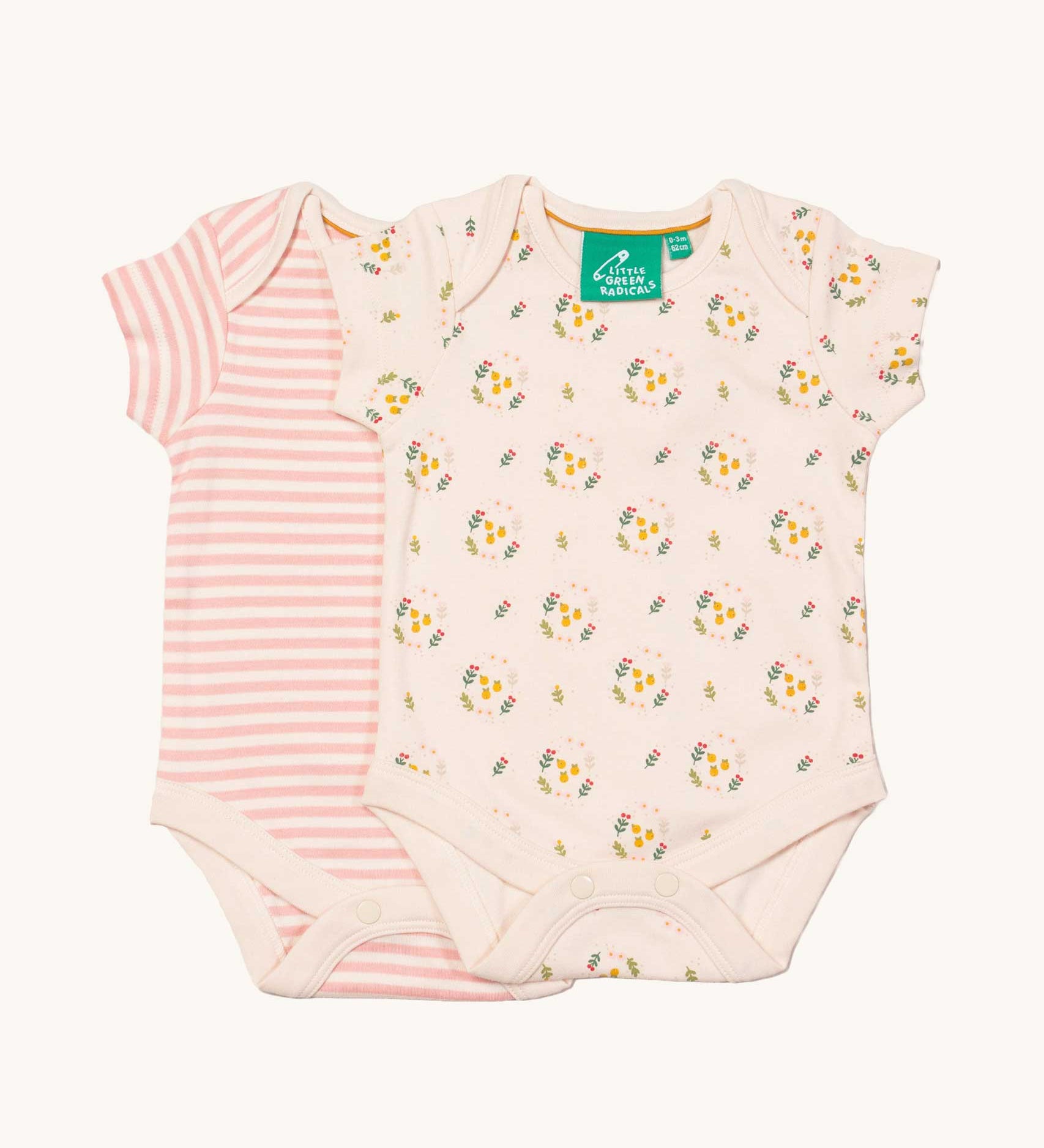 A 2 pack of Little Green Radicals Quince Flowers Baby Body Set. One vest has a pink and white stripe with the other vest featuring an all over quince flower print. These short sleeved baby best are part of a wide range of organic cotton baby clothes available at Babipur.
