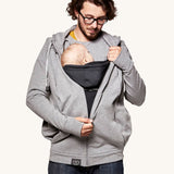 An adult wearing the Love Radius Parents Hoodie In Heather Grey, with a child inside showing the wrap-over chest cover. On a cream background