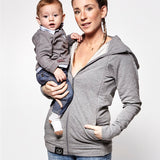 with a child inside showing the wrap-over chest cover. On a cream background