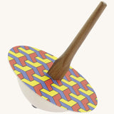 The Mader 'So And So' DIY wooden spinning top, with the '3D' design cardboard panel