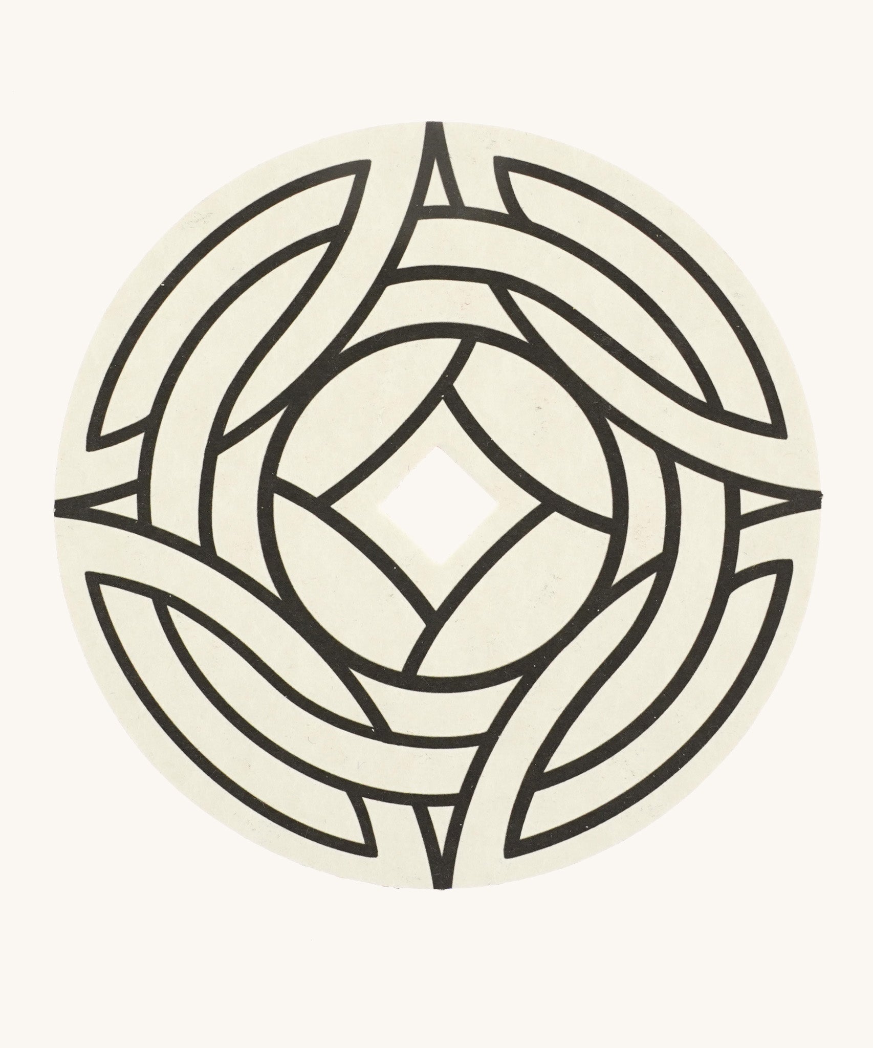 The DIY 'wattle' design cardboard panel to go on the Mader wooden spinning top.