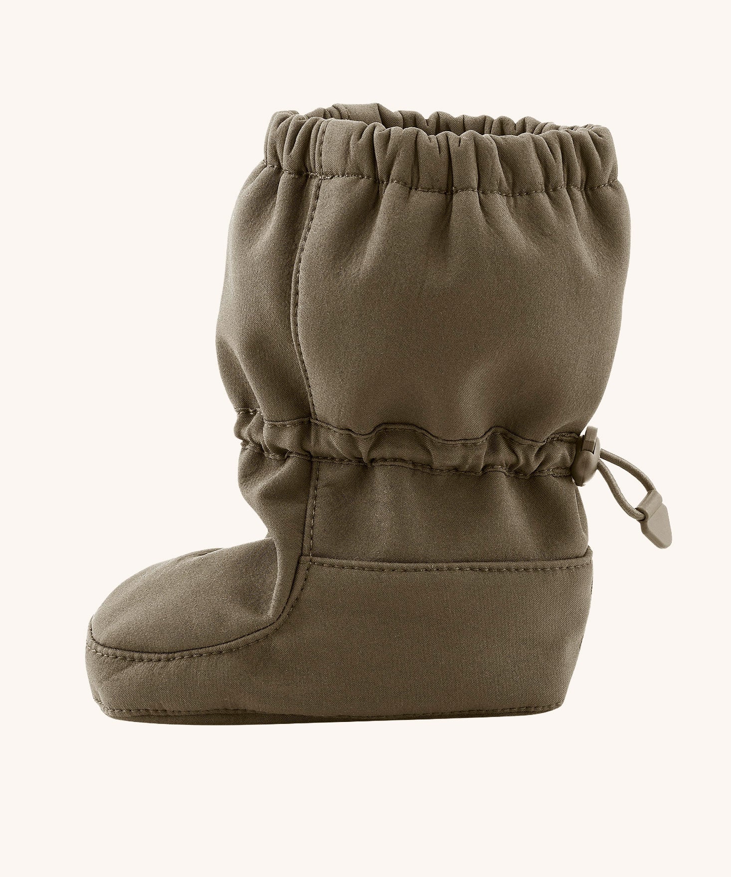 Side image of the Mamalila baby allrounder winter booties in the khaki green colour available at Babipur showing the elasticated ankle cuff detail