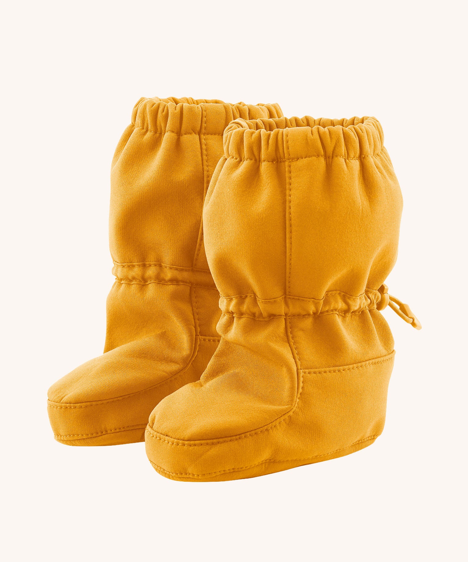 Mamalila  toddler allrounder winter booties in the mustard yellow colour available at Babipur.