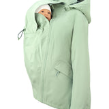 A person wearing the Mamalila Outdoor Explorer Babywearing Jacket - Black