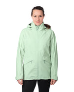 A person wearing the Mamalila Outdoor Explorer Babywearing Jacket - Mint