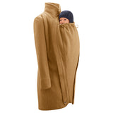 Mamalila Eco Wool Oslo Babywearing Coat in Camel. A light tan boiled wool winter babywearing coat. Side view, with babywearing insert on front. White background.