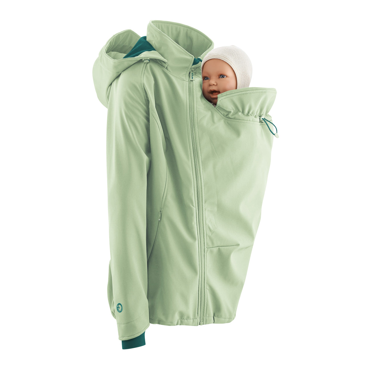 The Mamalila Soft Shell jacket is the ultimate all-rounder jacket for pregnancy, babywearing and beyond, in a solid pale green. Showing the babywearing panel zipped into the coat.