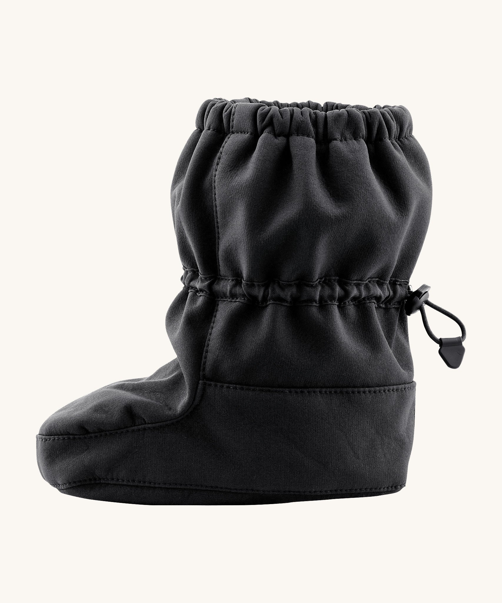 Side image of the Mamalila toddler allrounder winter booties in the black colour available at Babipur showing the elasticated ankle cuff detail