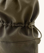 A close up of the Mamalila  toddler allrounder winter booties in the khaki green colour available at Babipur showing the toggle detail