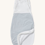 MORI baby swaddle bag. 100% organic bamboo and cotton swaddle in blue and white stripes. Features poppers by the arms and neck for easy fitting and a zip down the side and bottom for easy changing