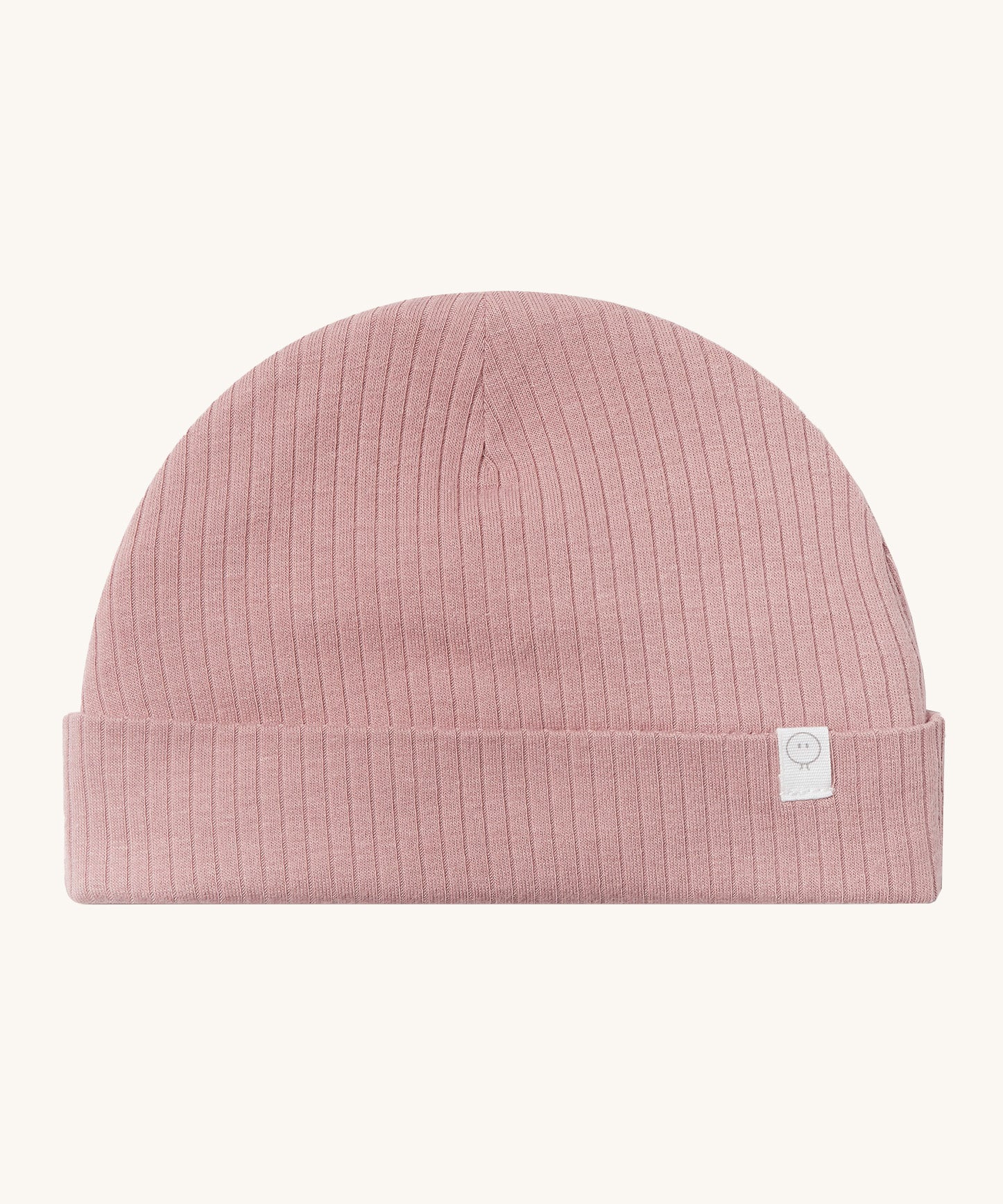 MORI hat in rose. A light pink ribbed style beanie made from bamboo and organic cotton. Features an soft turn up brim