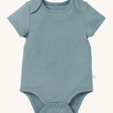 MORI short sleeve body suit in sky blue. A ribbed style bodysuit made from bamboo and organic cotton. Features 3 poppers at the crotch for easy fitting