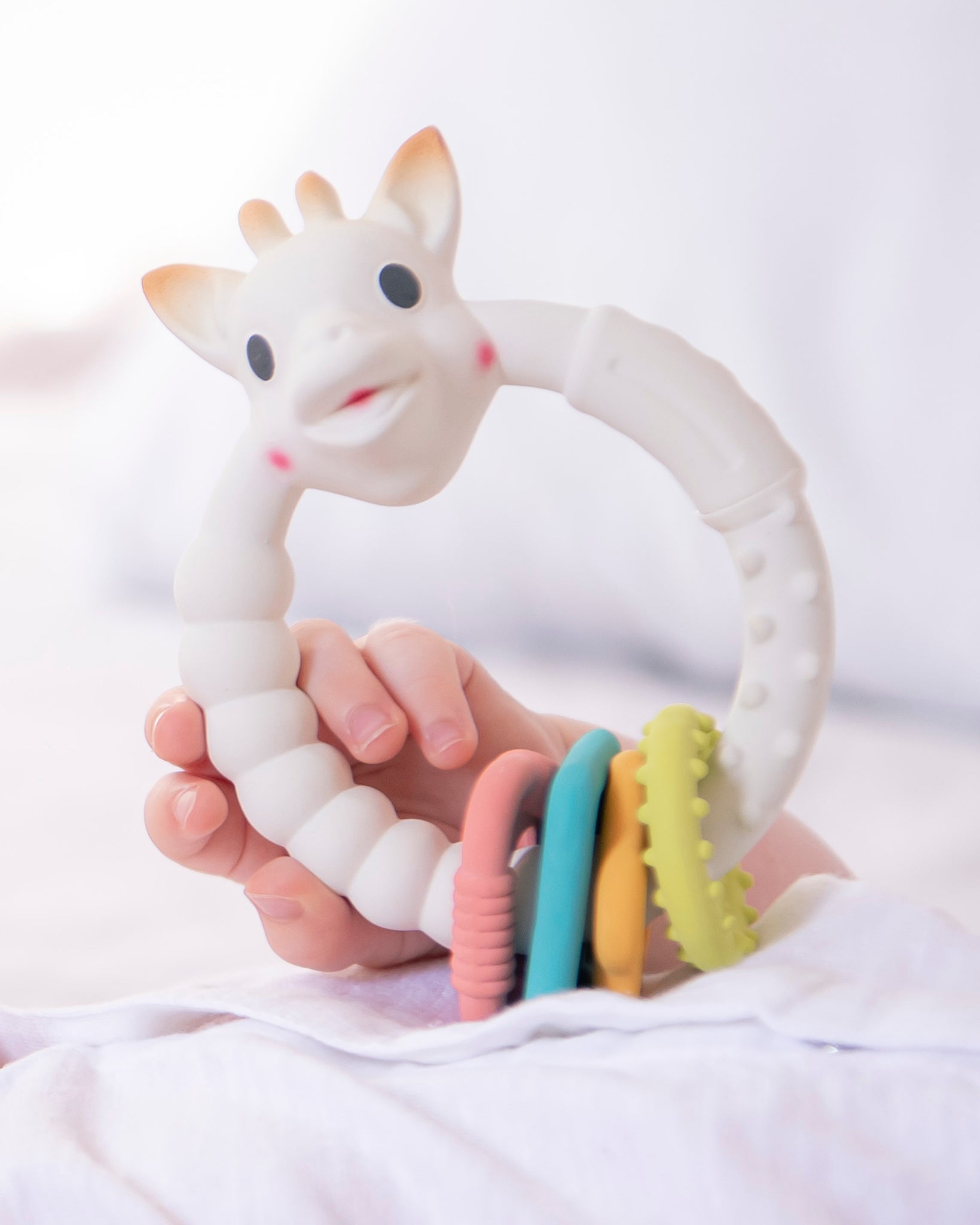 multi textured white teething ring