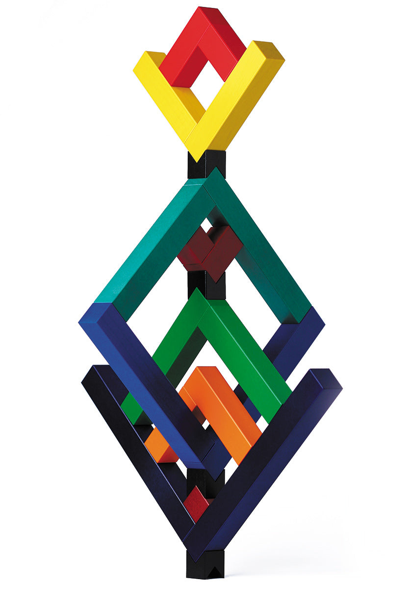 Naef's Angular construction toy arranged to make a complex geometric shape in front of a white background.