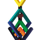 Naef's Angular construction toy arranged to make a complex geometric shape in front of a white background.