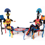 Naef Art model kit made into two people sat at a table and chair on a white background