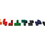 Pieces of the Naef campanile eco-friendly wooden block puzzle laid out on a white background