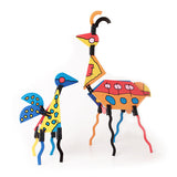 Naef sustainable cardboard Art Uris model kit built into two birds on a white background