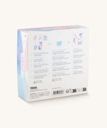 The back of the gift box showing the list of contents in the Namaki Hummingbird Trio Children's beauty Gift Set. The set contains a blue coloured nail polish, a sheet of tatoos and a lip gloss. Namaki have a range of natural and organic face paint sets and makeup for kids available at Babipur.