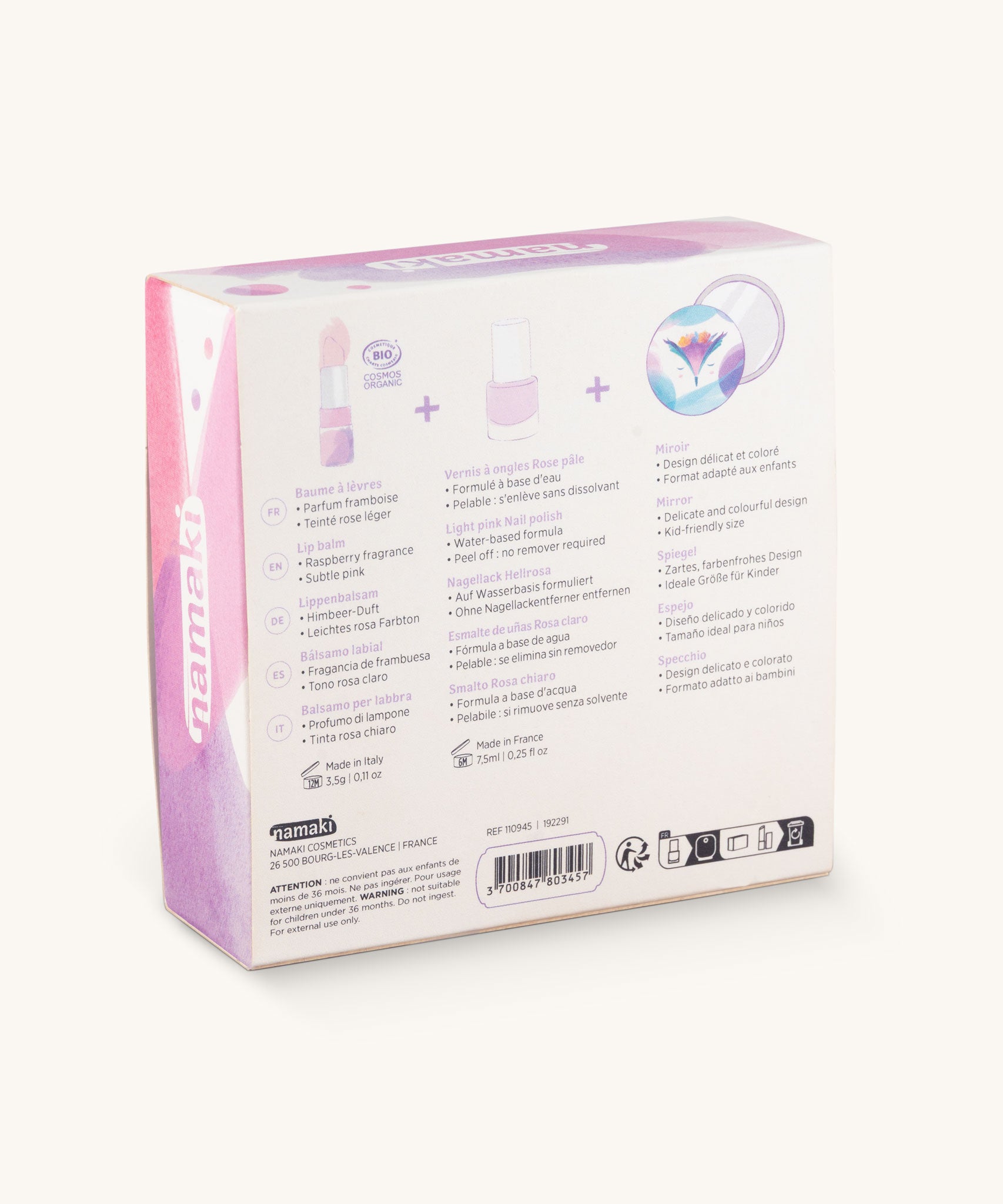 The back of the gift box showing the list of contents in the Namaki Nightingale Trio Children's beauty Gift Set. The set contains a pink coloured nail polish, a compact mirror and a raspberry lip balm. Namaki have a range of natural and organic face paint sets and makeup for kids available at Babipur.