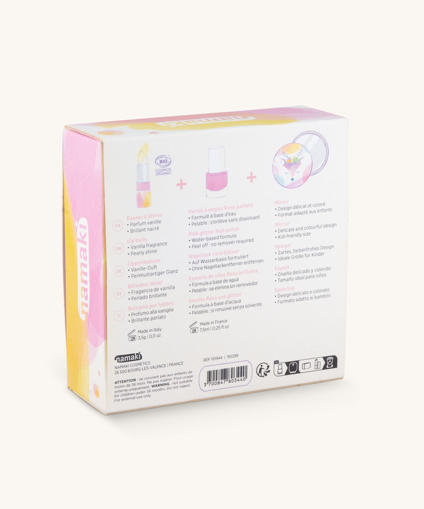 The back of the Namaki Swallow Trio Children's beauty Gift Set box showing the contents of the box. The set contains a pink coloured nail polish, a compact mirror and a vanilla lip balm. Namaki have a range of natural and organic face paint sets and makeup for kids available at Babipur.