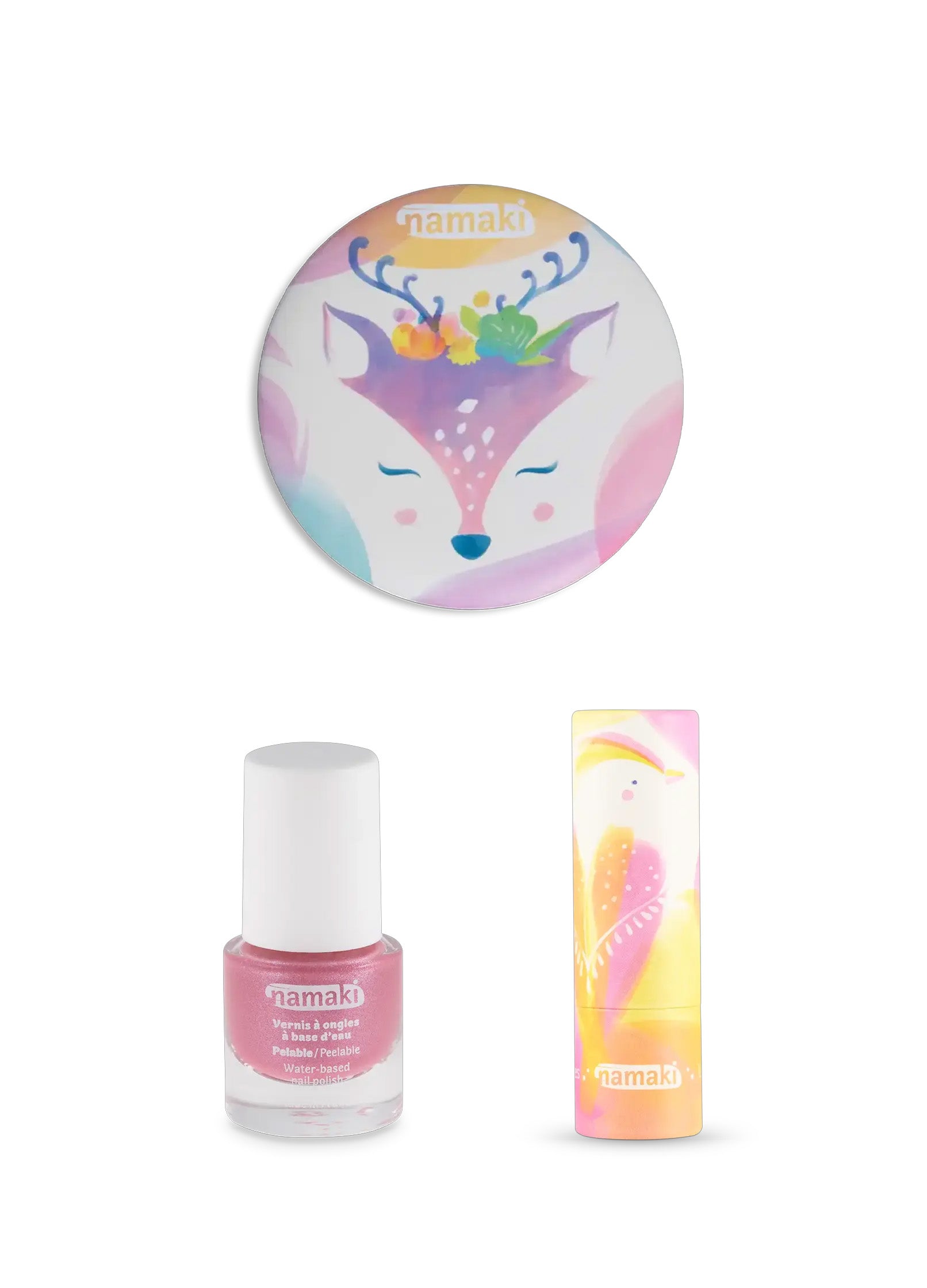 The contents of the Namaki child-friendly, non-toxic makeup trio giftset; a sparkly nail polish, a compact mirror, and a natural lip balm.