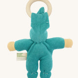 Back view of the turquoise Nanchen Pimpel Doll highlighting the gathered seams, soft organic cotton terry material, and light wooden ring for teething.