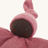 A close up of the face of the Nanchen Pimpel Waldorf Handcrafted Doll.  The small comforter doll is the perfect size for little hands to snuggle.
